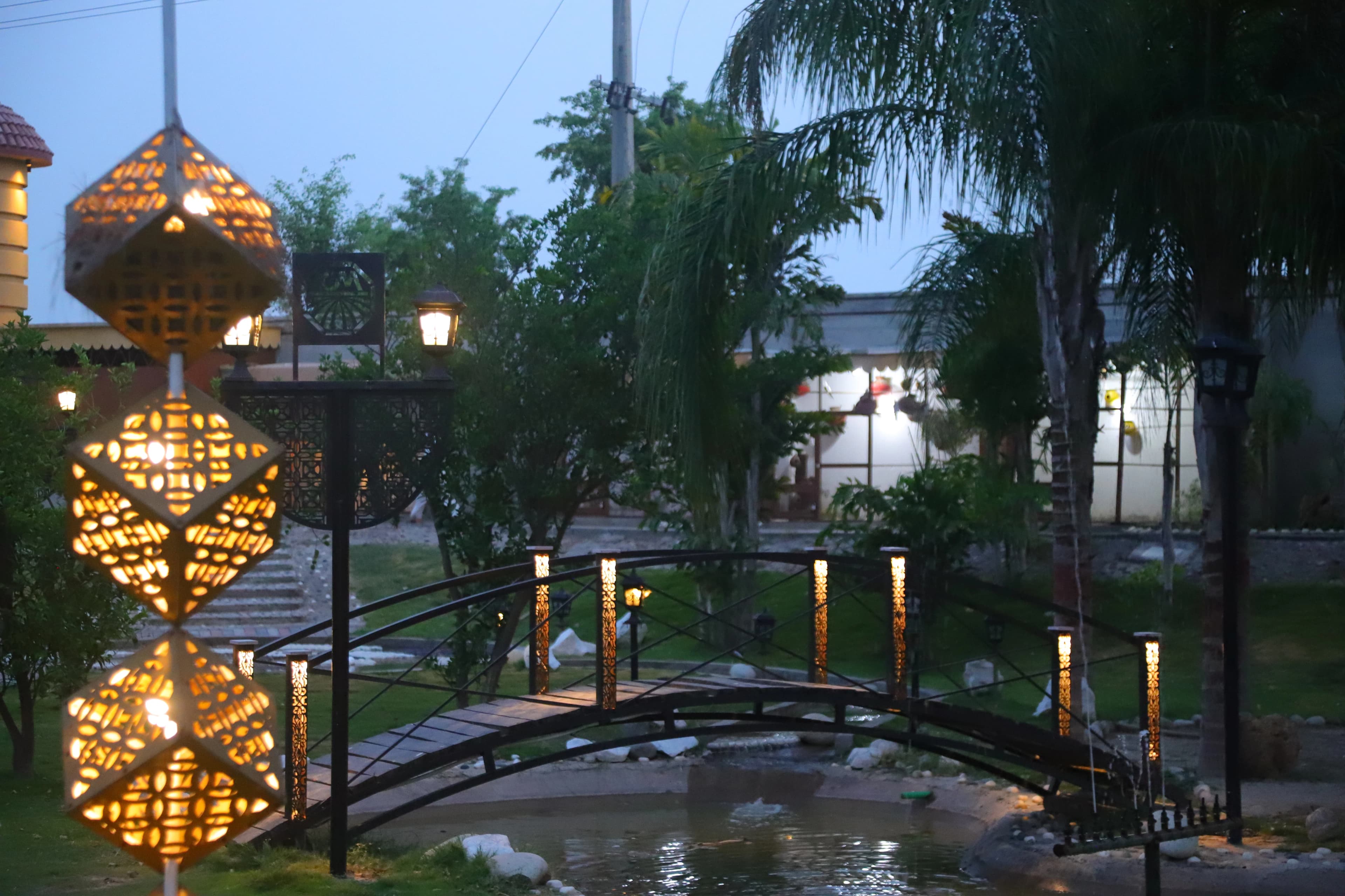 Lantern feature and bridge at dusk in the couple shoot area