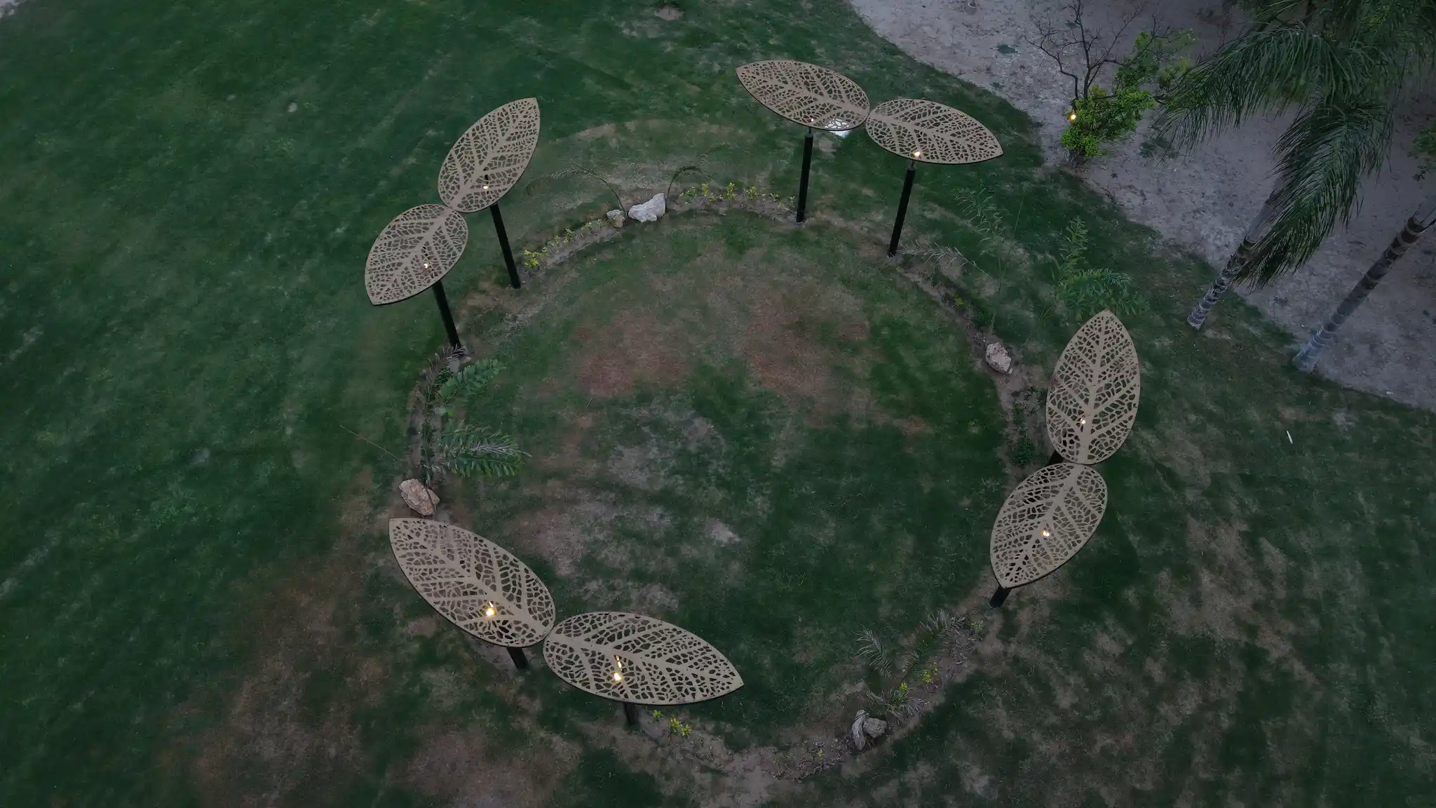 Wide drone view of the landscaped grounds and walking paths