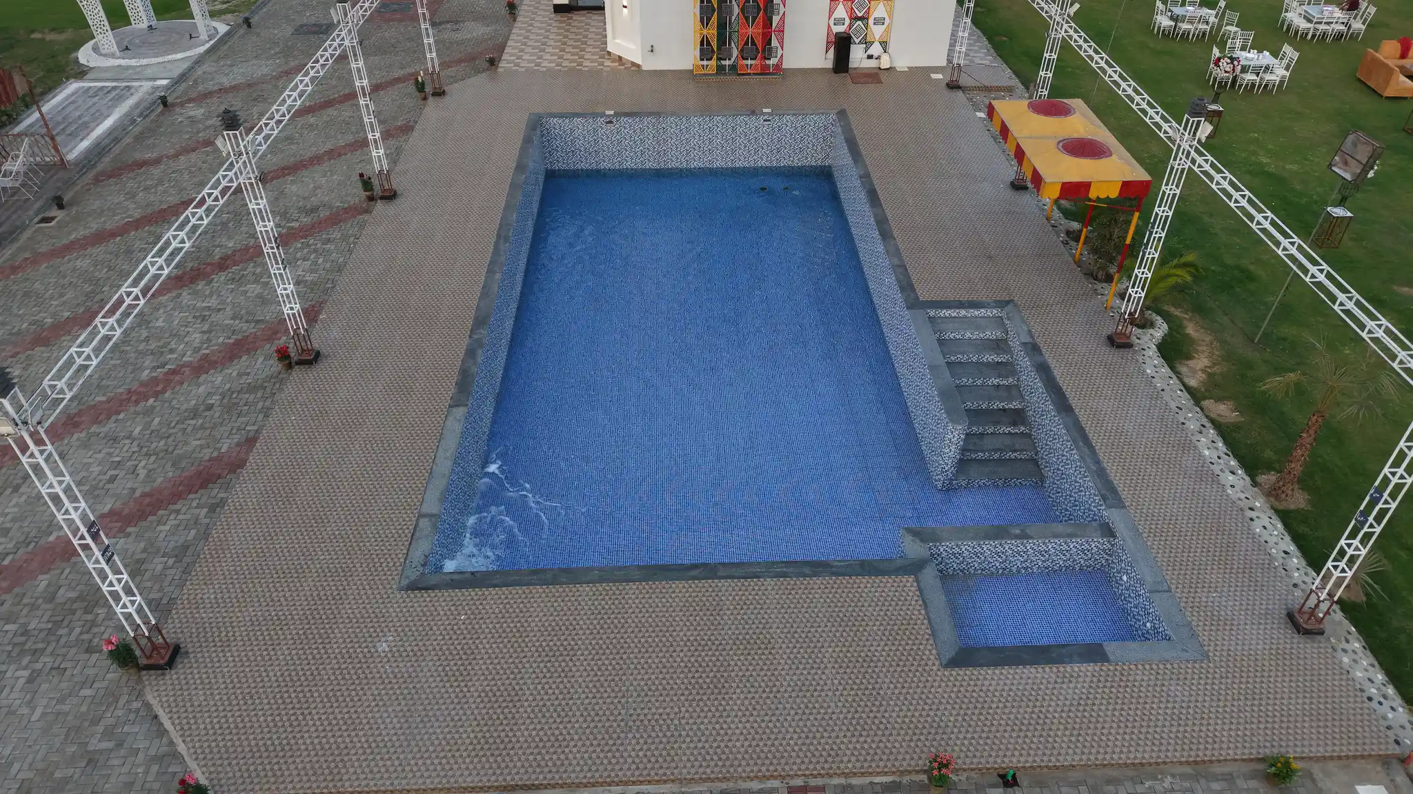 Large pool with tiled steps and deck area at Green Meadows Farm